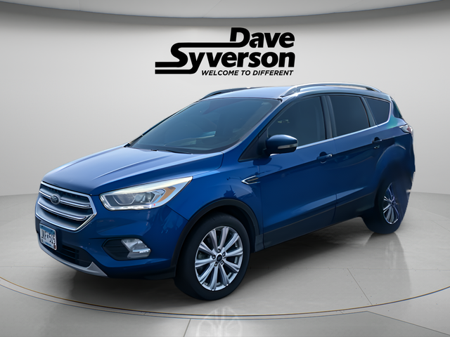 2017 Ford Escape Titanium in Lightning Blue Metallic — front three-quarter view