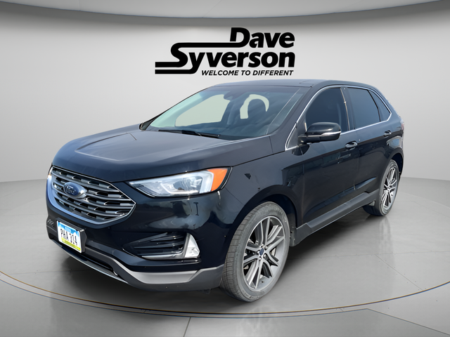 2019 Ford Edge Titanium in Agate Black Metallic — front three-quarter view
